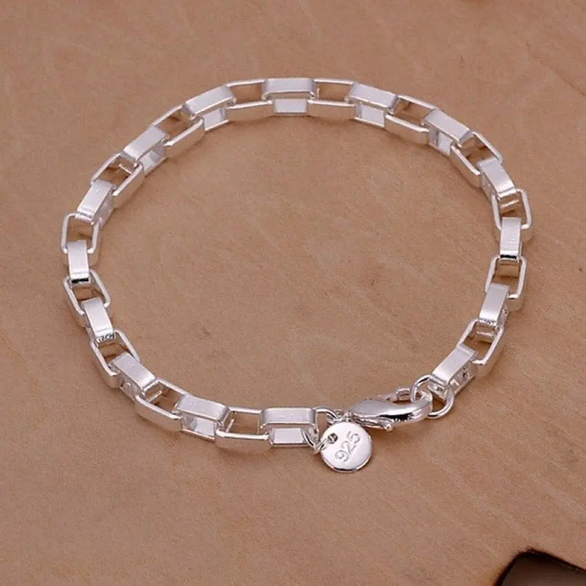 18K gold 5mm sideways chain bracelet with sterling silver accents, suitable for women and men, stylish jewelry for any occasion