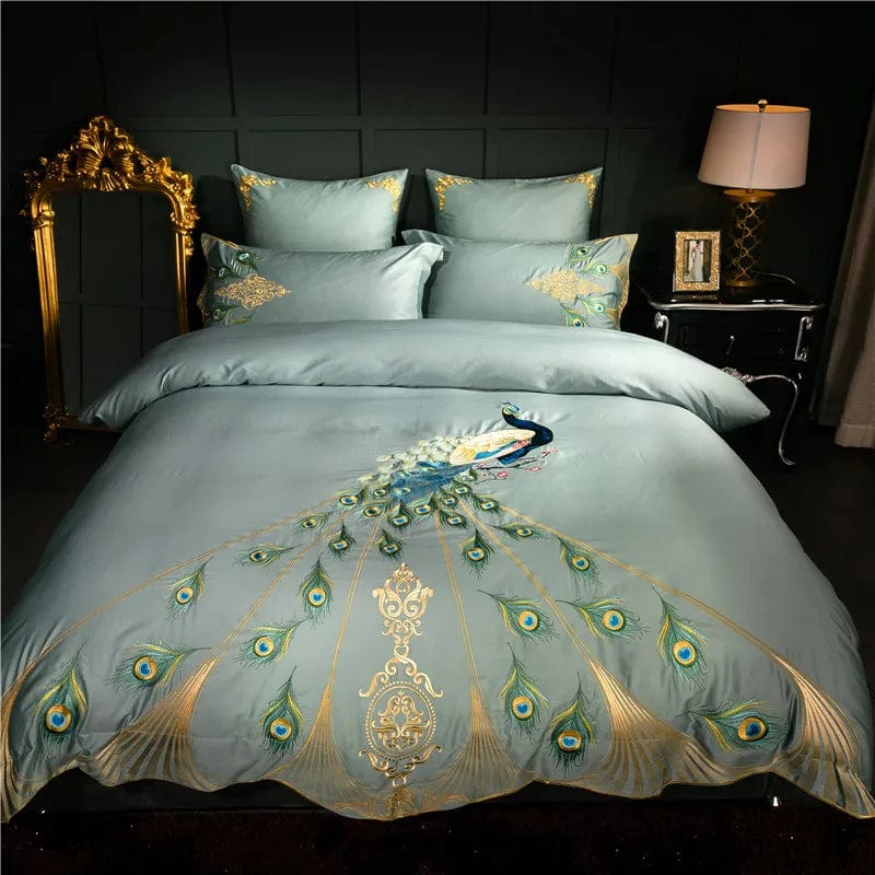 Luxury peacock Egyptian cotton duvet cover set for Cal King bed, featuring elegant embroidery and matching pillow shams.