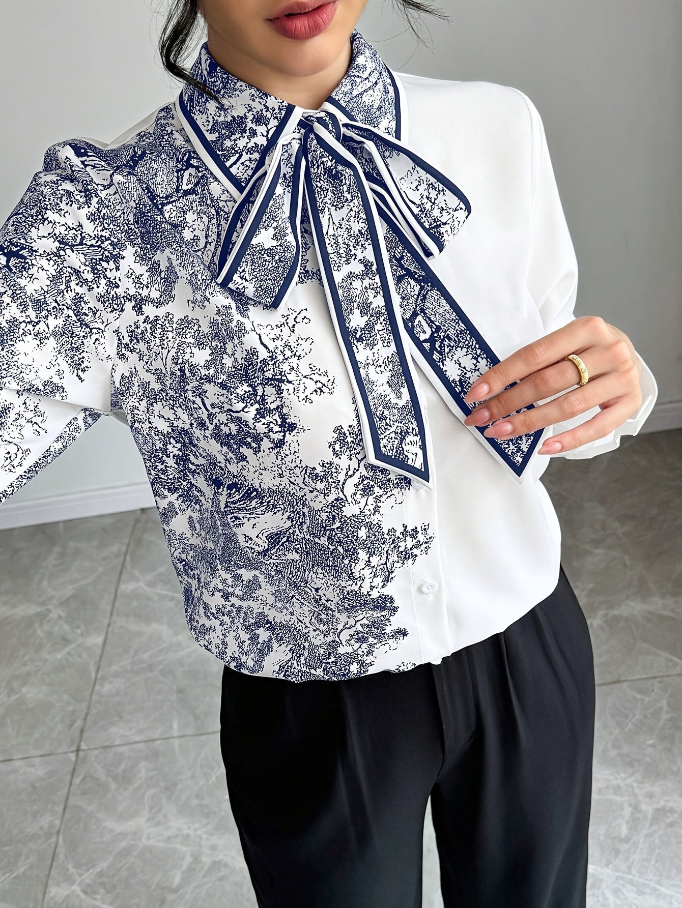 Women's semi-sheer floral bow tie blouse with long sleeves by SHOWLU FASHION STORE, featuring a stylish and elegant design.