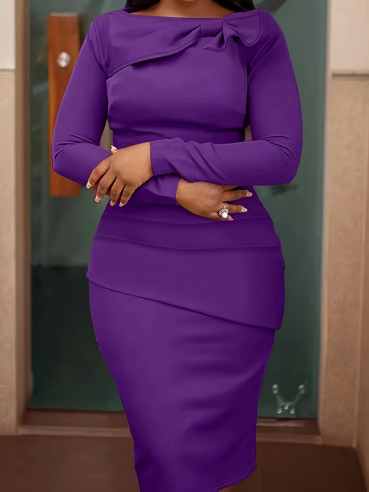 SHOWLU FASHION solid color bow decor bodycon dress with long sleeves, elegant design, and fitted silhouette.