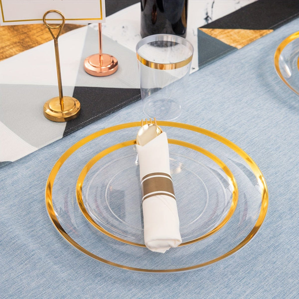 Showlu 840-piece gold plastic dinnerware set with clear plates and wrapped gold cutlery for large gatherings or parties.