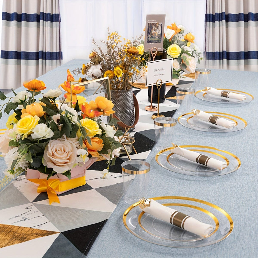 Showlu 840-piece gold plastic dinnerware set with clear plates and cutlery, ideal for large parties or events.