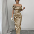 Red off-shoulder bodycon maxi dress with a low slit from SHOWLU FASHION, displayed on a model showing its fitted silhouette and elegant style.