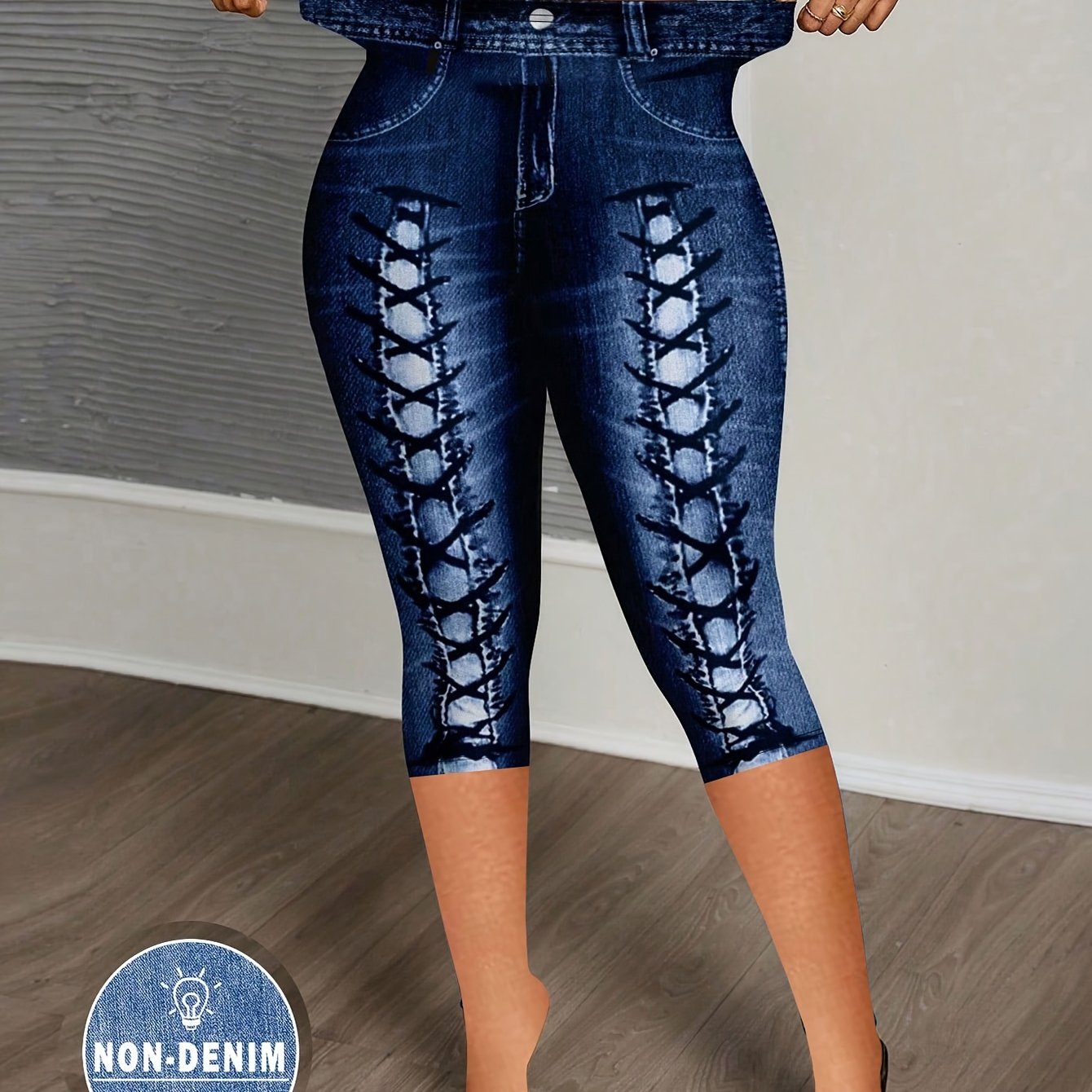 Showlu Fashion women's imitation denim print leggings, stretchy skinny pants with a denim design, close-up of fabric detail.
