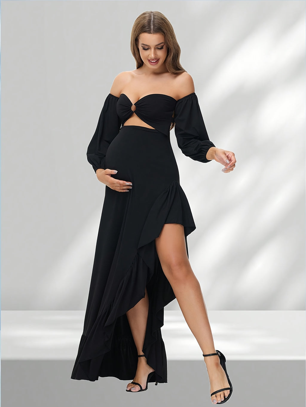 Maternity off-shoulder lantern sleeve dress with asymmetrical hem in soft fabric, designed for comfort and style.