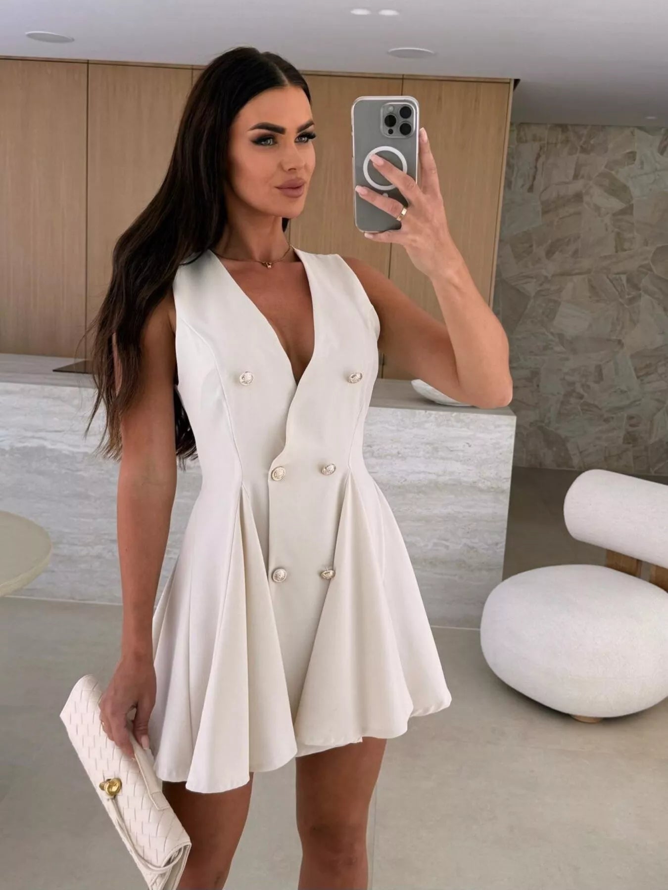 Double-breasted V-neck mini dress by Trendsi with long sleeves and a fitted silhouette, shown in a stylish black fabric.