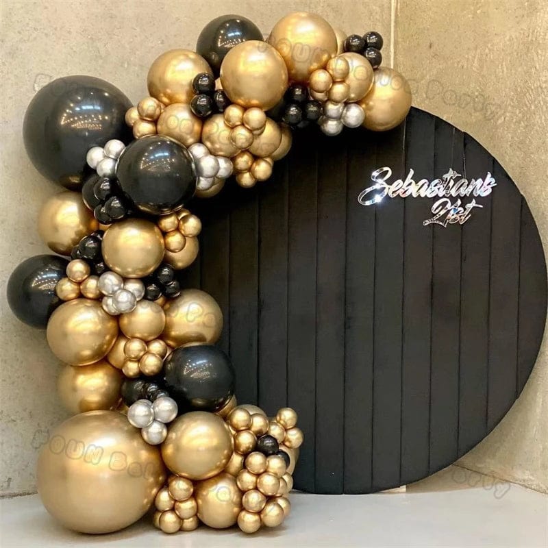 Showlu 97-piece black and gold balloon arch garland kit with chrome latex balloons, perfect for weddings, graduations, and celebrations.