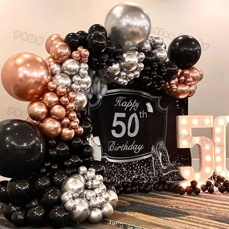 Showlu Black and Gold Balloon Arch Garland Kit with chrome latex balloons, perfect for weddings, birthdays, and celebrations.