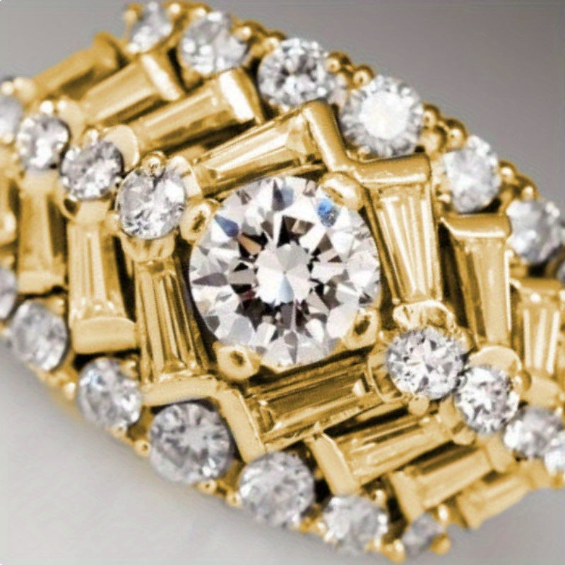 SHOWLU 14K gold-plated wide carved ring with white zirconia inlay, featuring intricate design and sparkling gemstone accents.