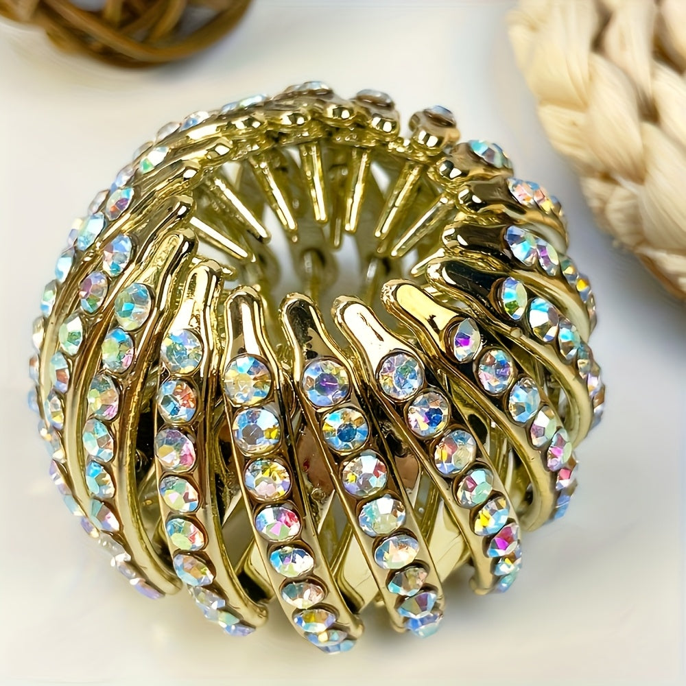 Cubidupi bird nest magic hair clip with rhinestones, stylish ponytail holder in gold with intricate design and sparkling accents.