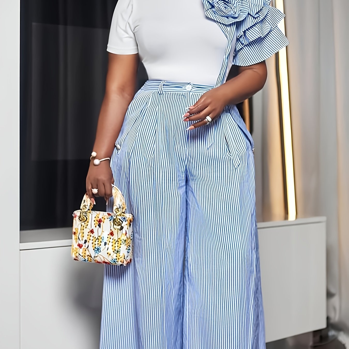SHOWLU Women's striped two-piece suit featuring a short sleeve top and wide-leg pants, casual and stylish fashion ensemble.