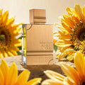Al Haramain Gold Eau De Parfum bottle featuring amber and vanilla notes, unisex fragrance in a 2oz glass bottle.