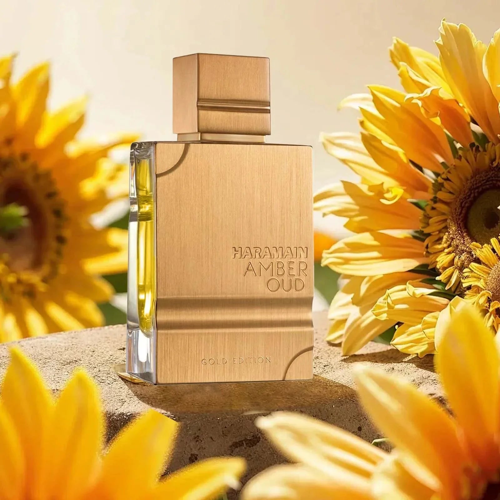 Al Haramain Gold Eau De Parfum bottle featuring amber and vanilla notes, unisex fragrance in a 2oz glass bottle.