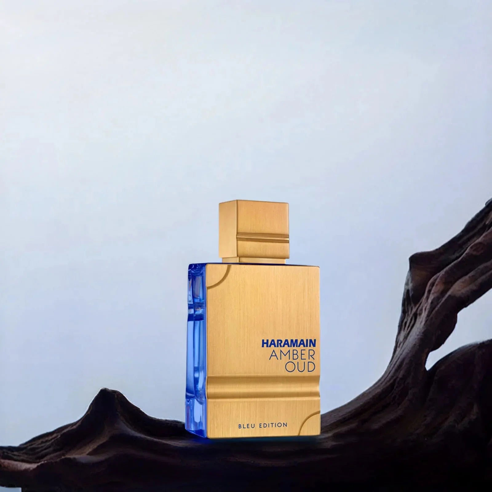 Unisex Al Haramain Amber Oud Blue Edition EDT spray in 2oz/60ml bottle, featuring a sleek blue packaging and elegant design