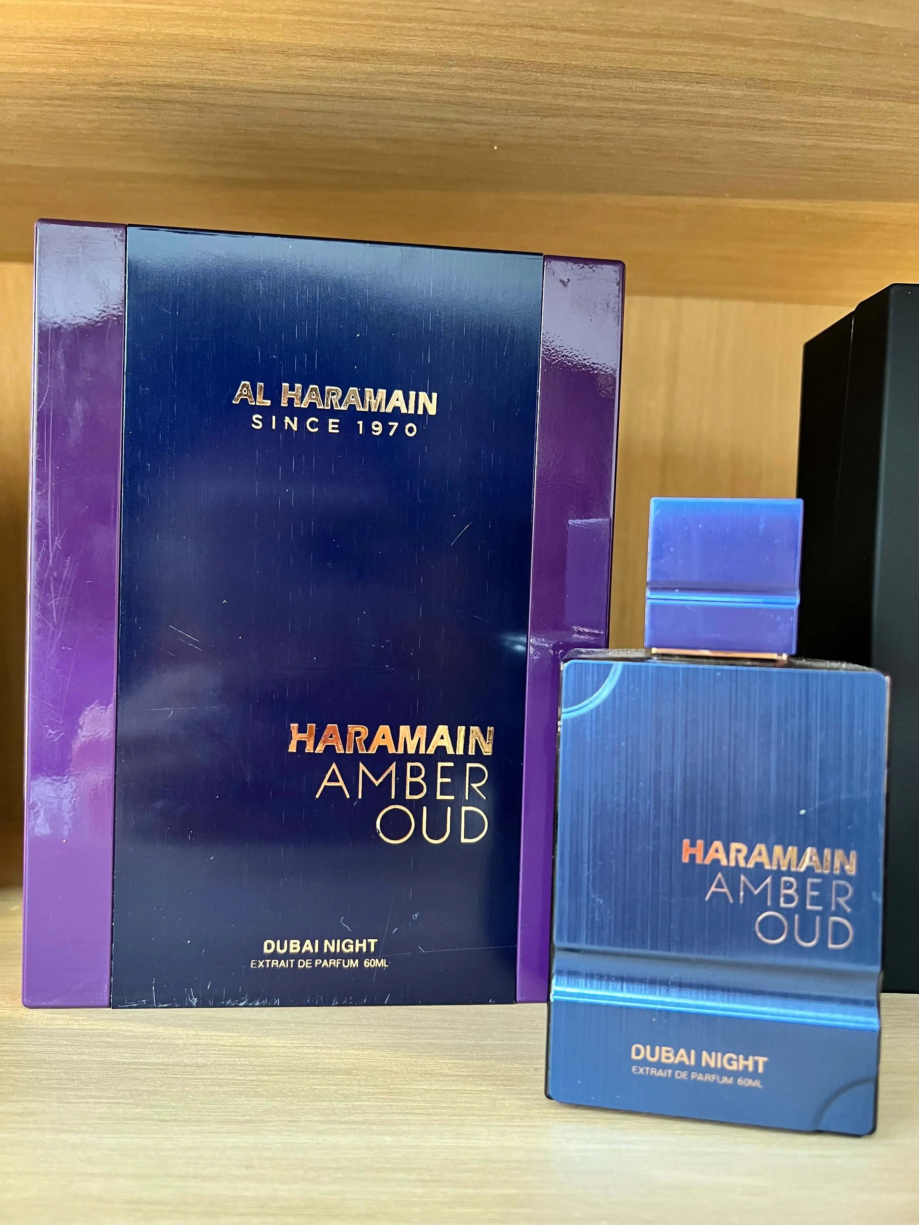 Al Haramain Amber Oud Dubai Night extrait de parfum 60ml bottle with elegant design and gold accents.