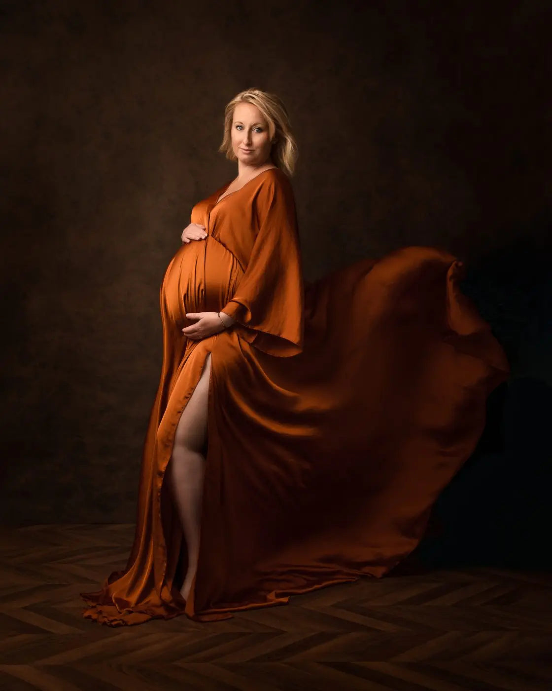 Showlu Boho maternity photography dress with v-neck, lace details, and slit, designed for elegant maternity photo shoots.