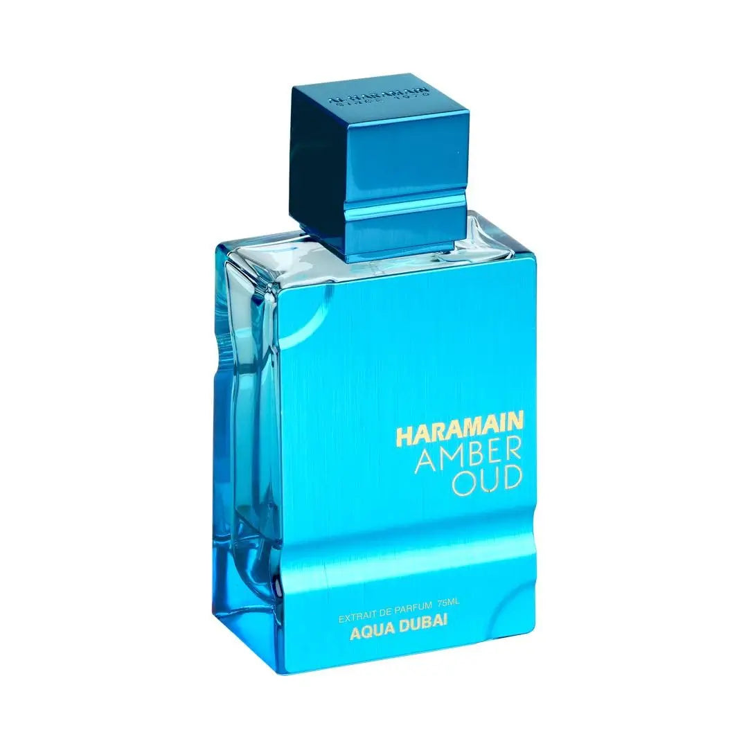 Amber Oud Aqua Dubai Extrait de Parfum by Al Haramain, 60ml bottle, elegant glass container with amber-hued fragrance liquid.