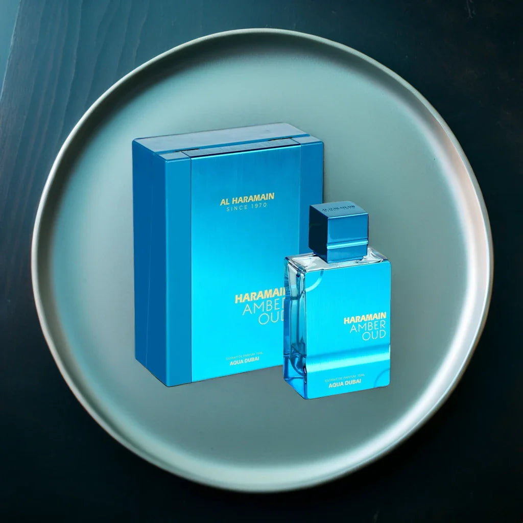 Al Haramain Amber Oud Aqua Dubai Extrait de Parfum 60ml bottle with elegant design and clear glass container.