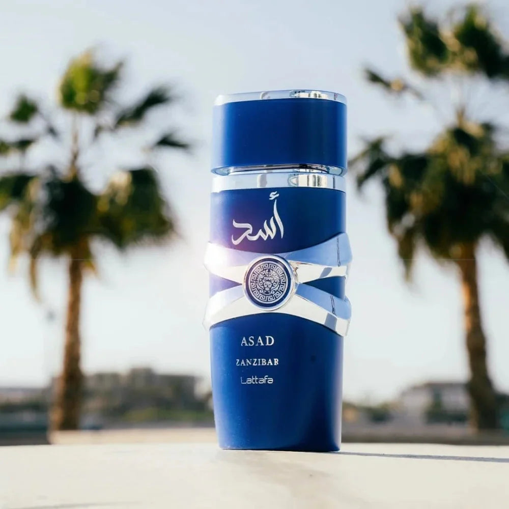 Lattafa Asad Zanzibar Blue Edition men's Eau de Parfum spray, 3.4 oz, featuring a sleek bottle with blue accents and elegant design.