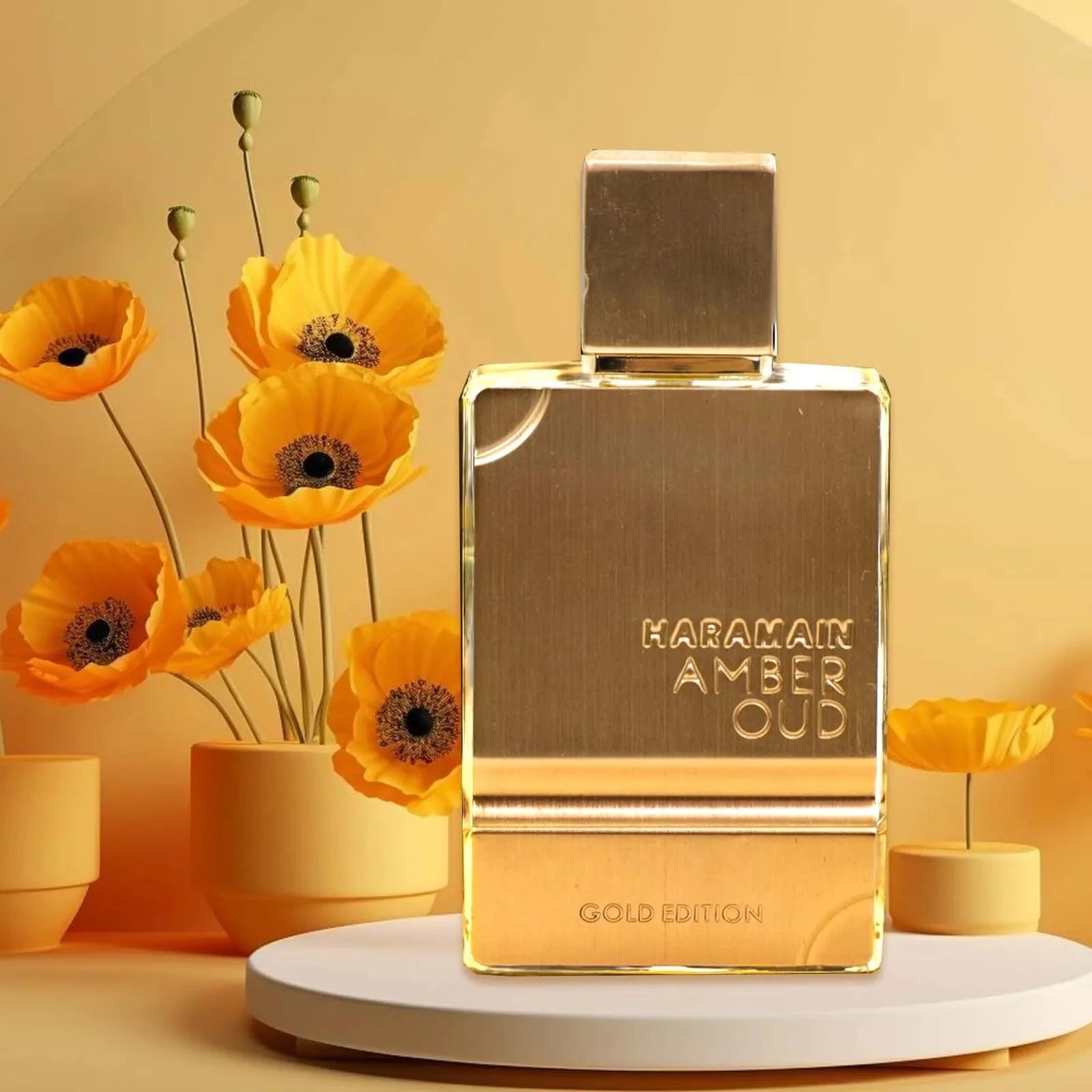 Al Haramain Gold Eau De Parfum bottle featuring amber and vanilla notes, unisex fragrance, 2oz, elegant glass container.