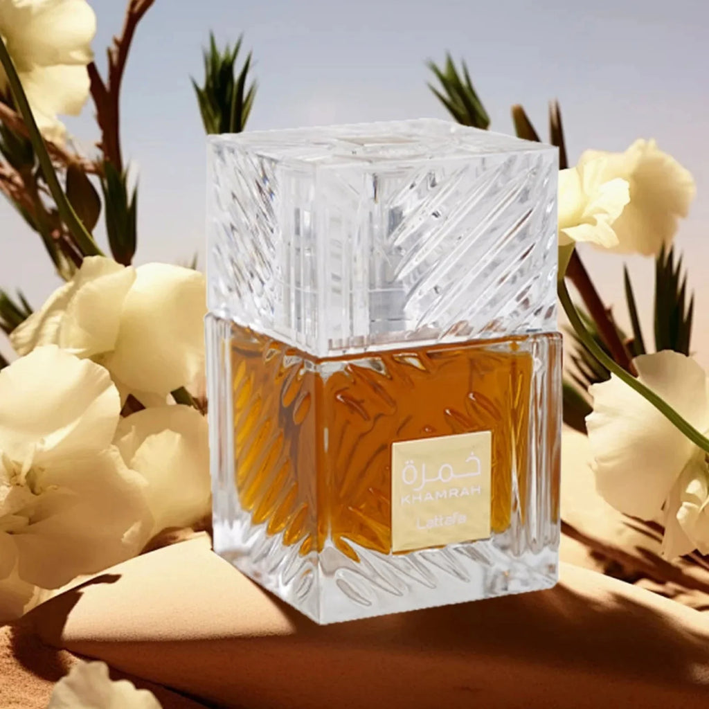 Unisex Lattafa Khamrah EDP perfume spray with spicy vanilla scent, 3.4 oz bottle, elegant design.
