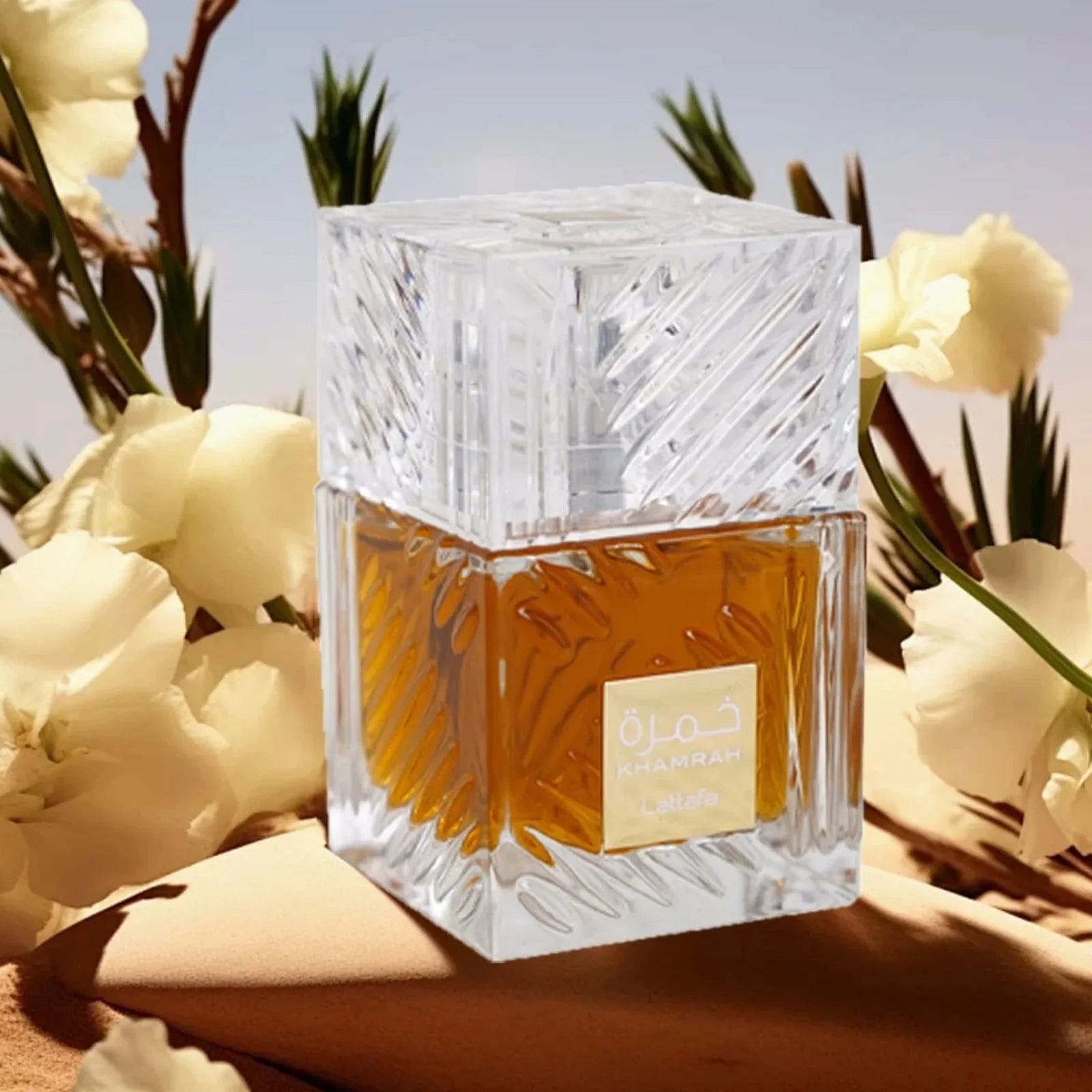 Unisex Lattafa Khamrah EDP perfume spray with spicy vanilla scent, 3.4 oz bottle, elegant design.