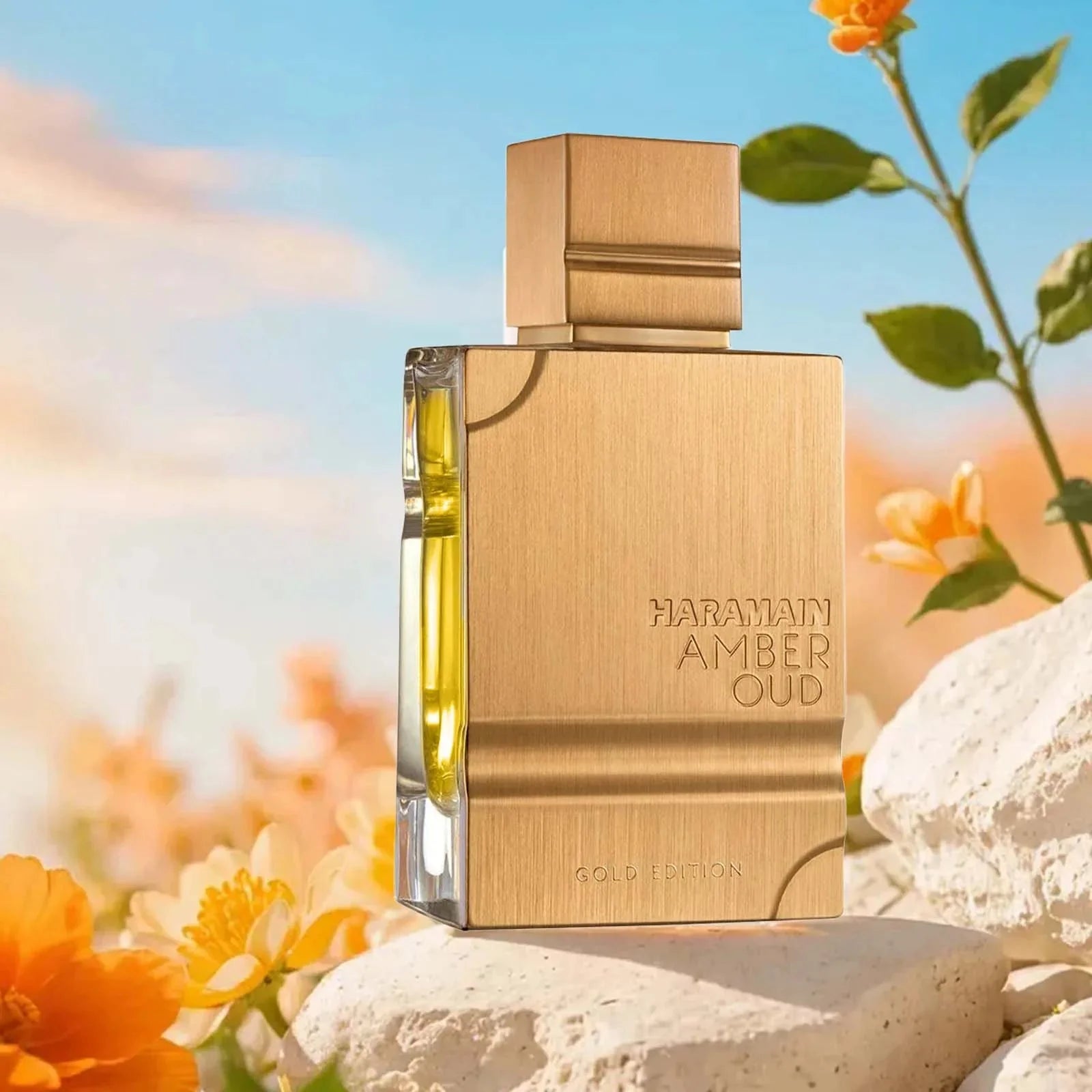 Al Haramain Gold Eau De Parfum bottle featuring amber and vanilla notes, unisex fragrance, 2oz, elegant gold packaging