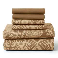A stack of brown microfiber sheets featuring a mix of solid and paisley patterned pieces.