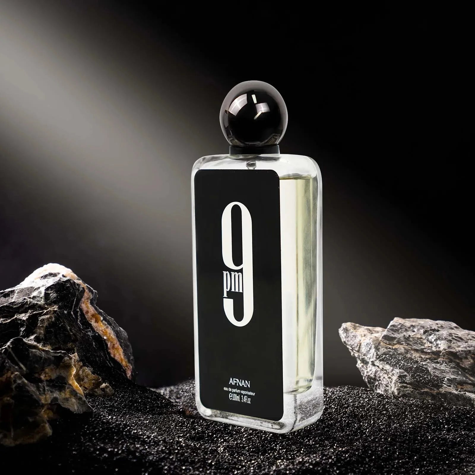 Afnan 9PM men's Eau De Parfum bottle with spicy scent, 3.4 oz, showcasing the sleek design and long-lasting fragrance.