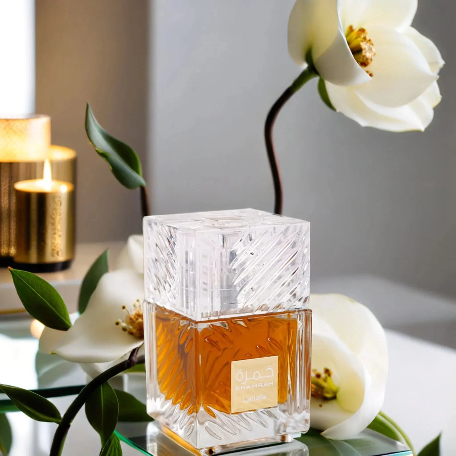Lattafa Khamrah EDP unisex spicy vanilla perfume spray, 3.4 oz, with warm, inviting fragrance and elegant bottle design.