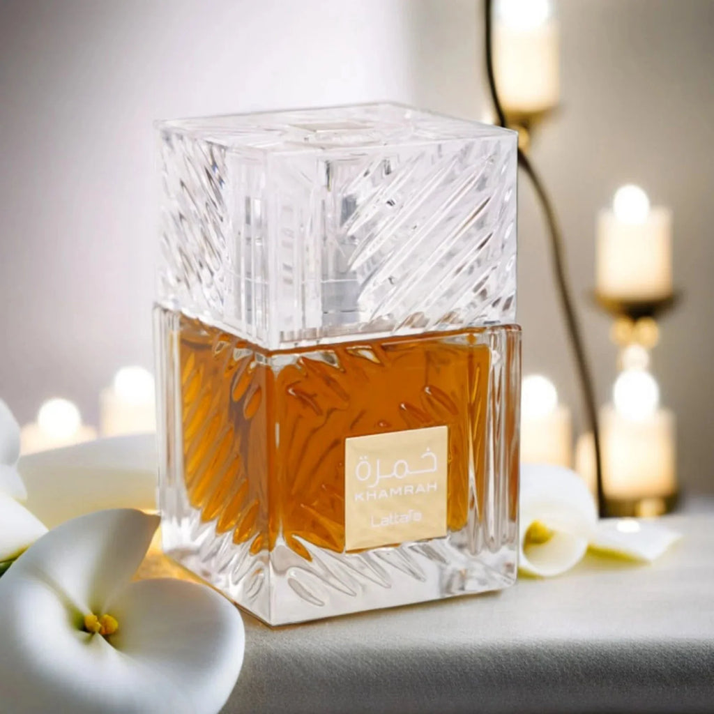 Unisex Lattafa Khamrah EDP perfume spray with spicy vanilla scent in a 3.4 oz bottle, featuring elegant packaging and design