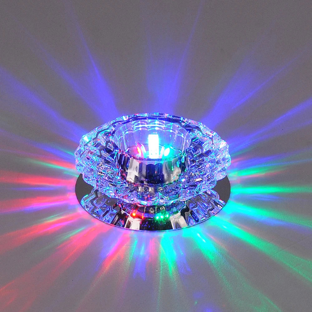 Modern crystal LED ceiling lamp with stainless steel chandelier design, featuring elegant hanging crystals and sleek metal finish.