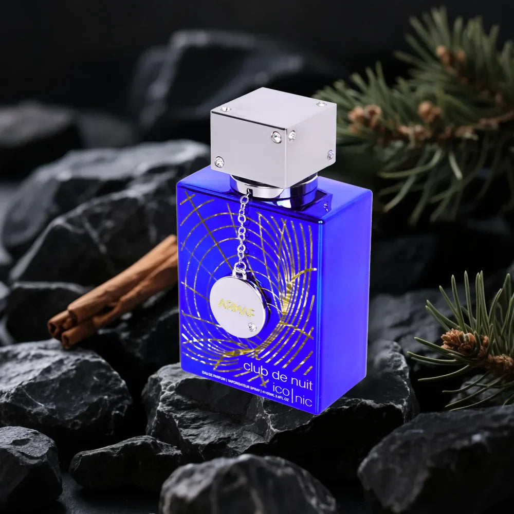 Armaf Club de Nuit Blue Iconic men's cologne bottle with blue accents, 3.6 oz, showcasing sleek packaging and design.