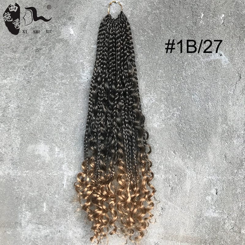African black faux locs crochet hair with three-strand braid extensions, goddess-inspired dreadlocks in a box style.