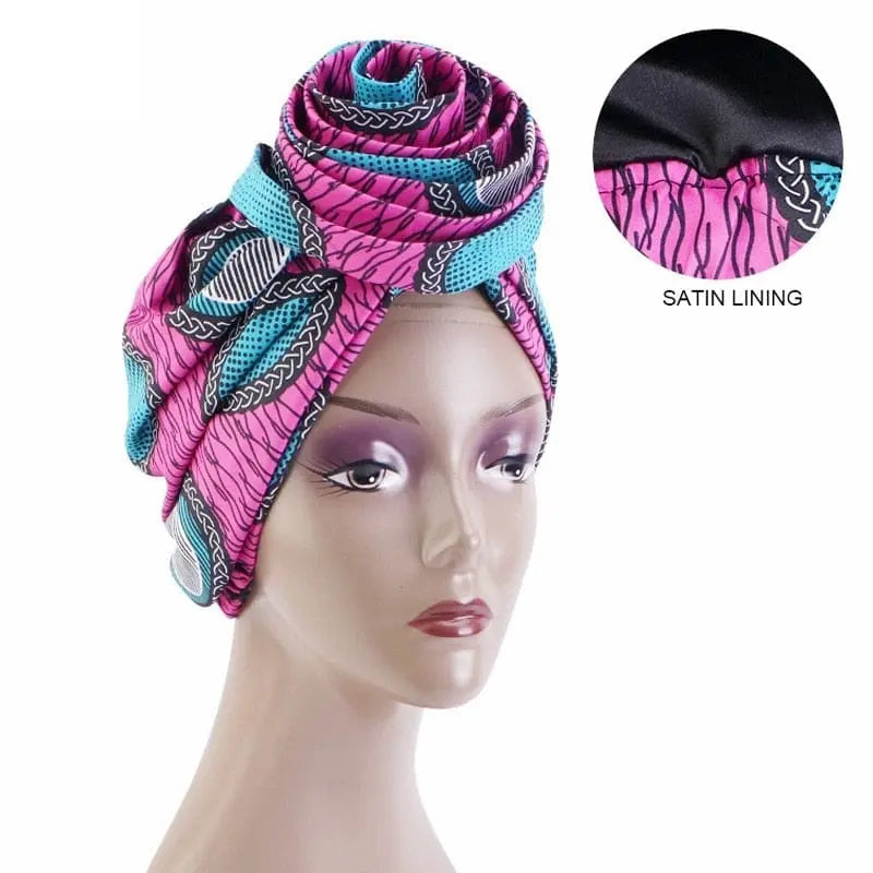 African print stretch bandana head wrap with satin floral Ankara design, styled as a versatile turban or hair accessory.
