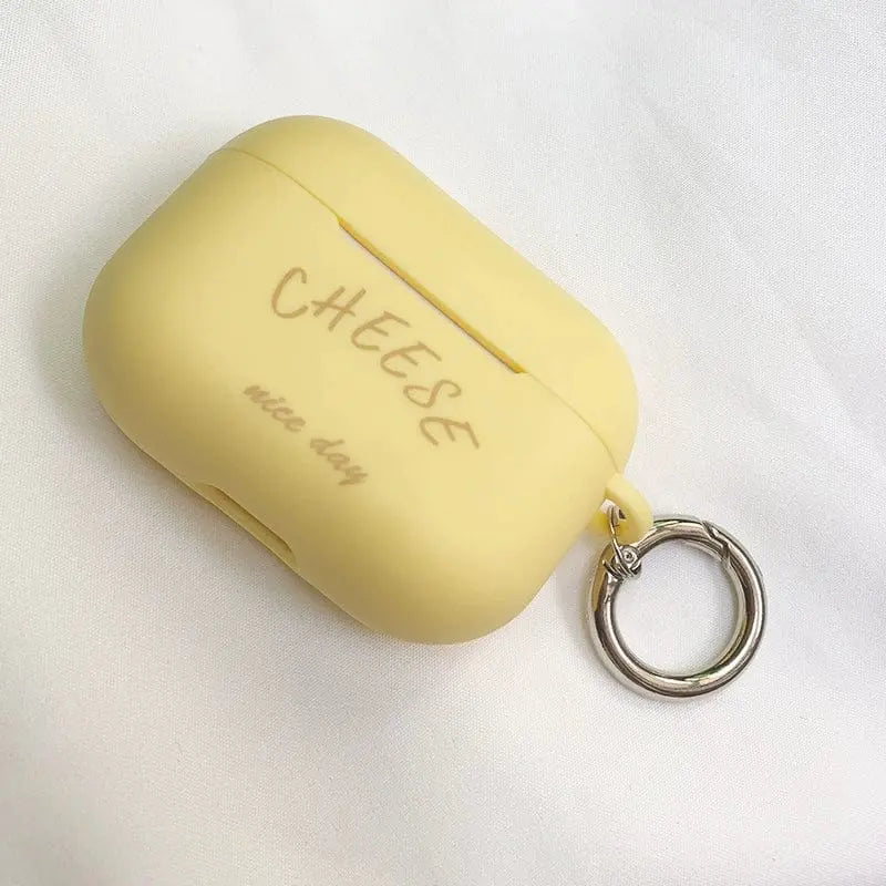 Showlu Fashion silicone cheese AirPods Pro 2 case, soft TPU cover with cute cheese design for Apple wireless earbuds.