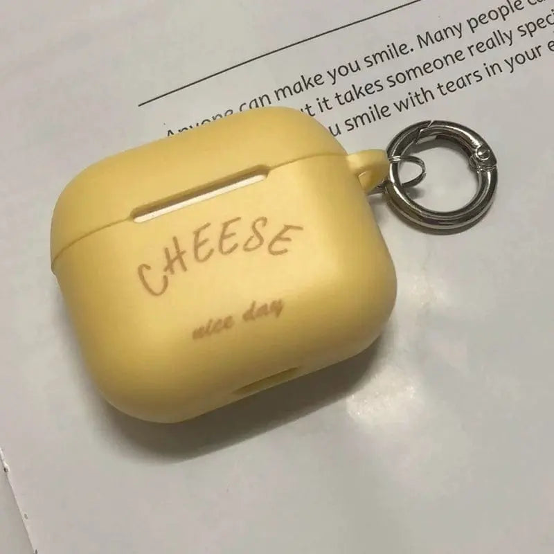 Showlu Fashion Store cheese silicone AirPods Pro 2 case, soft TPU protective cover with trendy, cute cheese design for wireless earbuds.