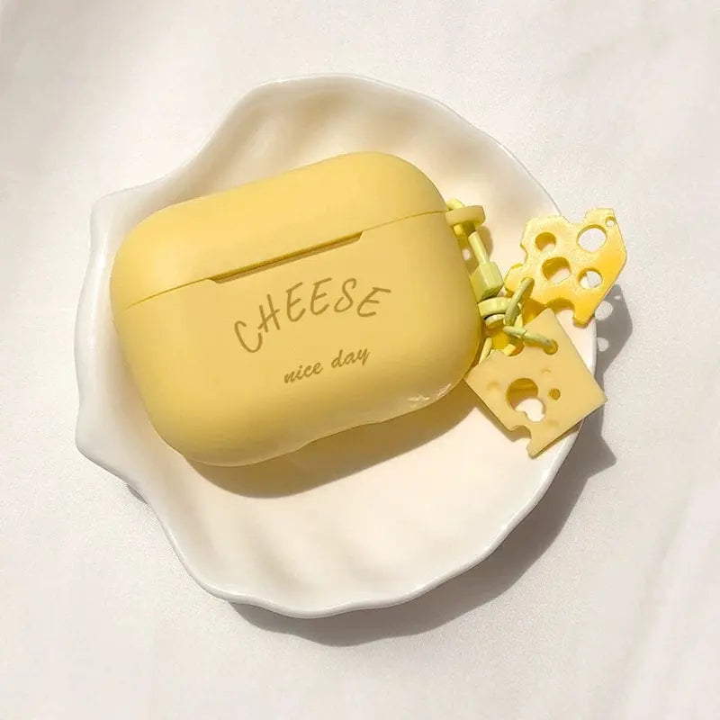 Showlu Fashion Store Free Light AirPods Pro 2 cheese silicone soft TPU case, trendy and protective for Apple wireless earbuds.