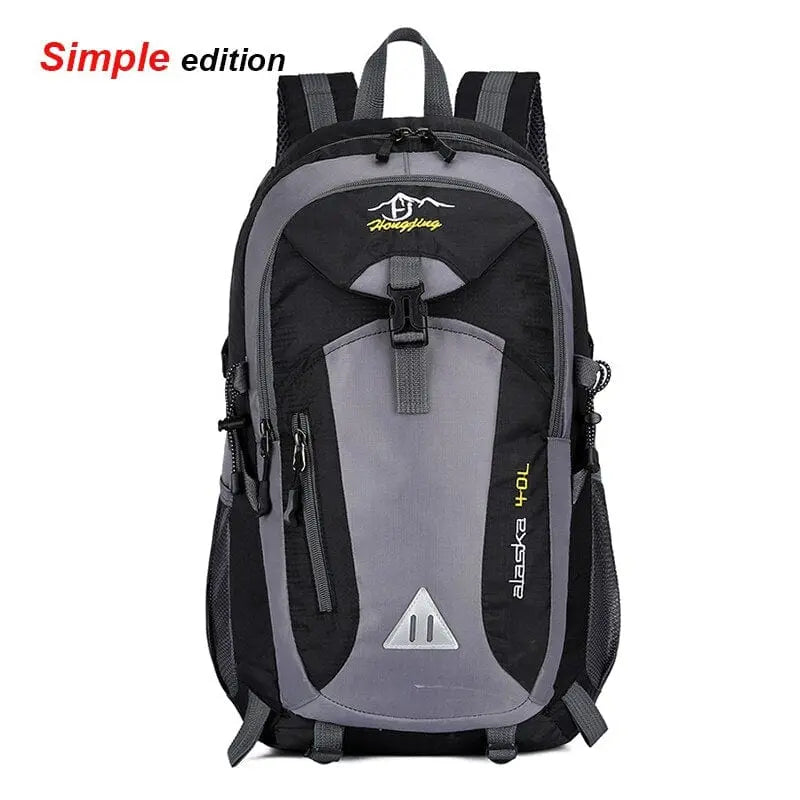 Showlu waterproof anti-theft hiking backpack in black with multiple compartments, designed for outdoor travel and outdoor adventures.