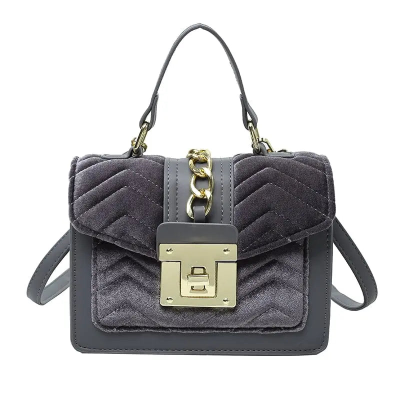 Showlu designer velvet shoulder bag for women, luxury fashion handbag with elegant leather accents and stylish design.