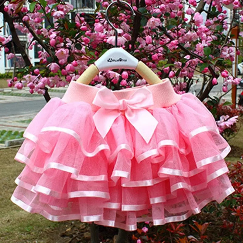 Baby girl rainbow tutu skirt by Showlu Fashion Store, made of tulle, perfect for ballet, dance, or special summer occasions.
