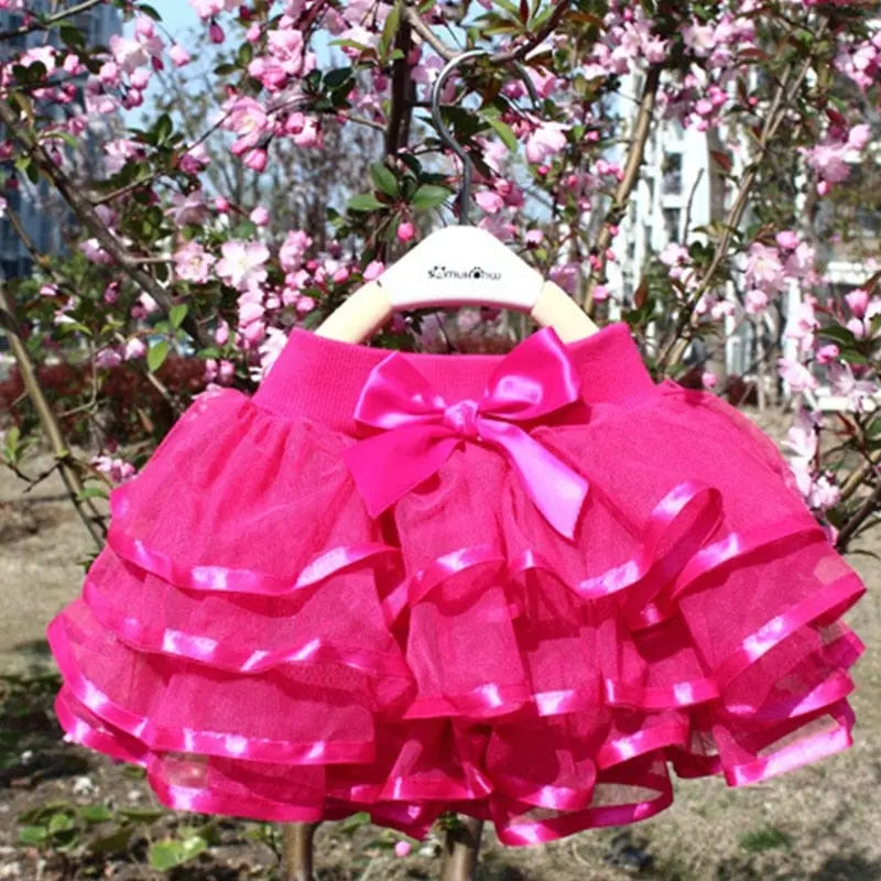 Baby girl rainbow tutu skirt by Showlu Fashion Store, soft tulle ballet dance pettiskirt for summer and special occasions.