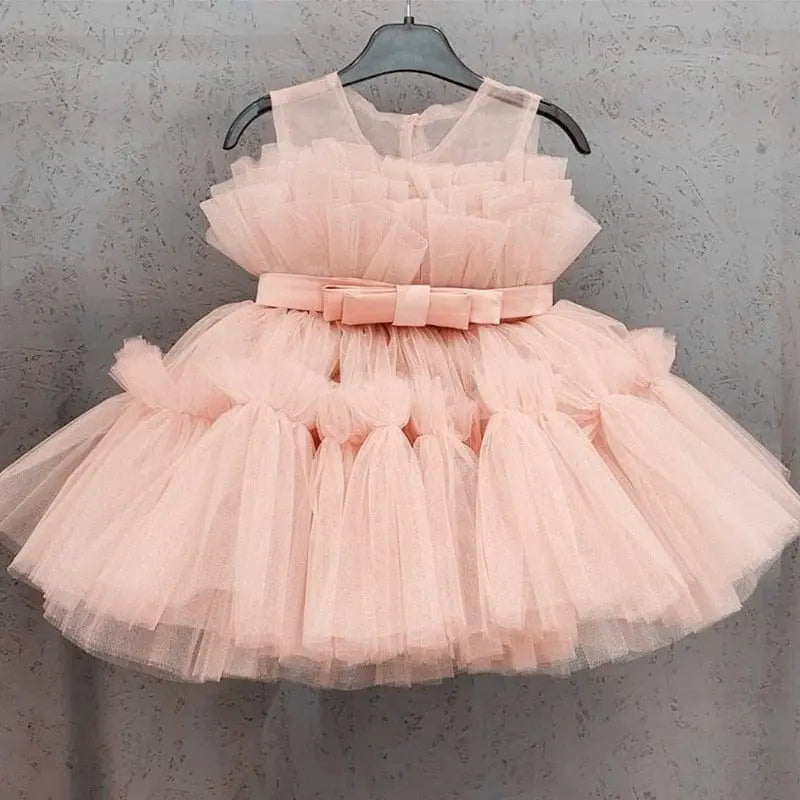 Baby girls floral tulle ball gown by Showlu Fashion Store, sleeveless with floral details, perfect for birthday or special occasions.