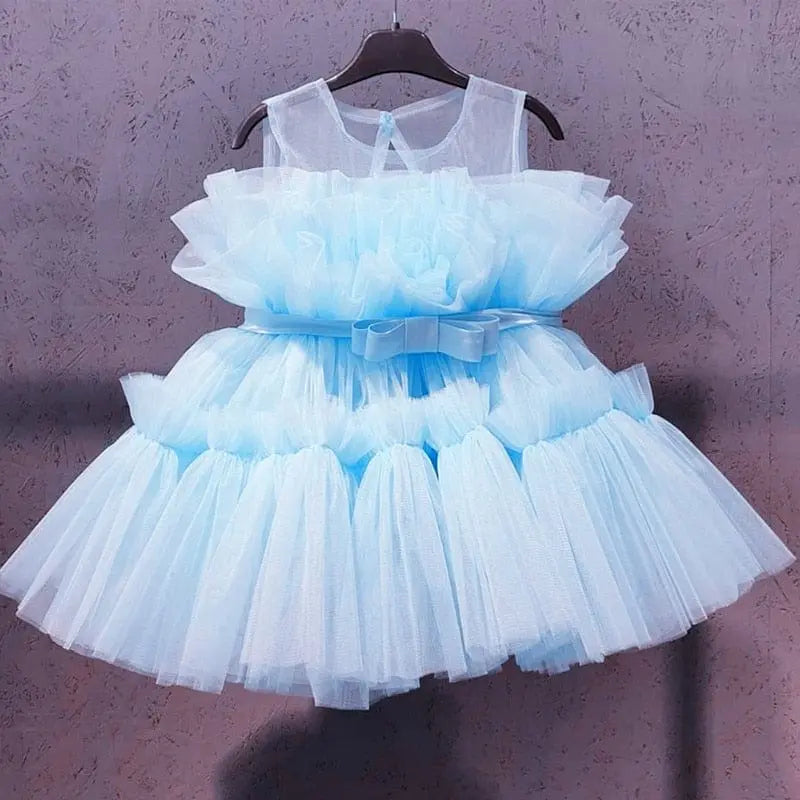 Baby girl floral tulle ball gown by Showlu Fashion Store, sleeveless with floral details, perfect for birthday or special occasions.