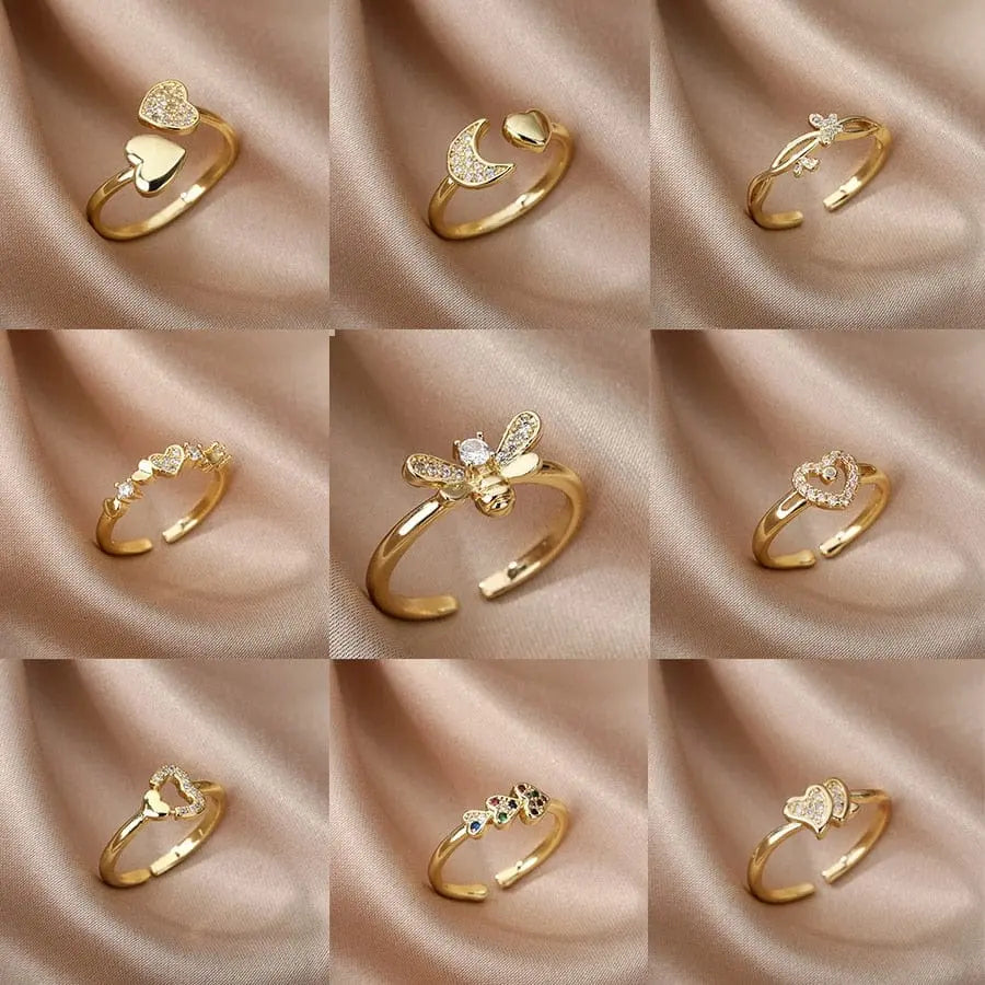 Stainless steel bee butterfly adjustable ring with cubic zirconia accents, elegant jewelry for women, featuring moon and heart designs.