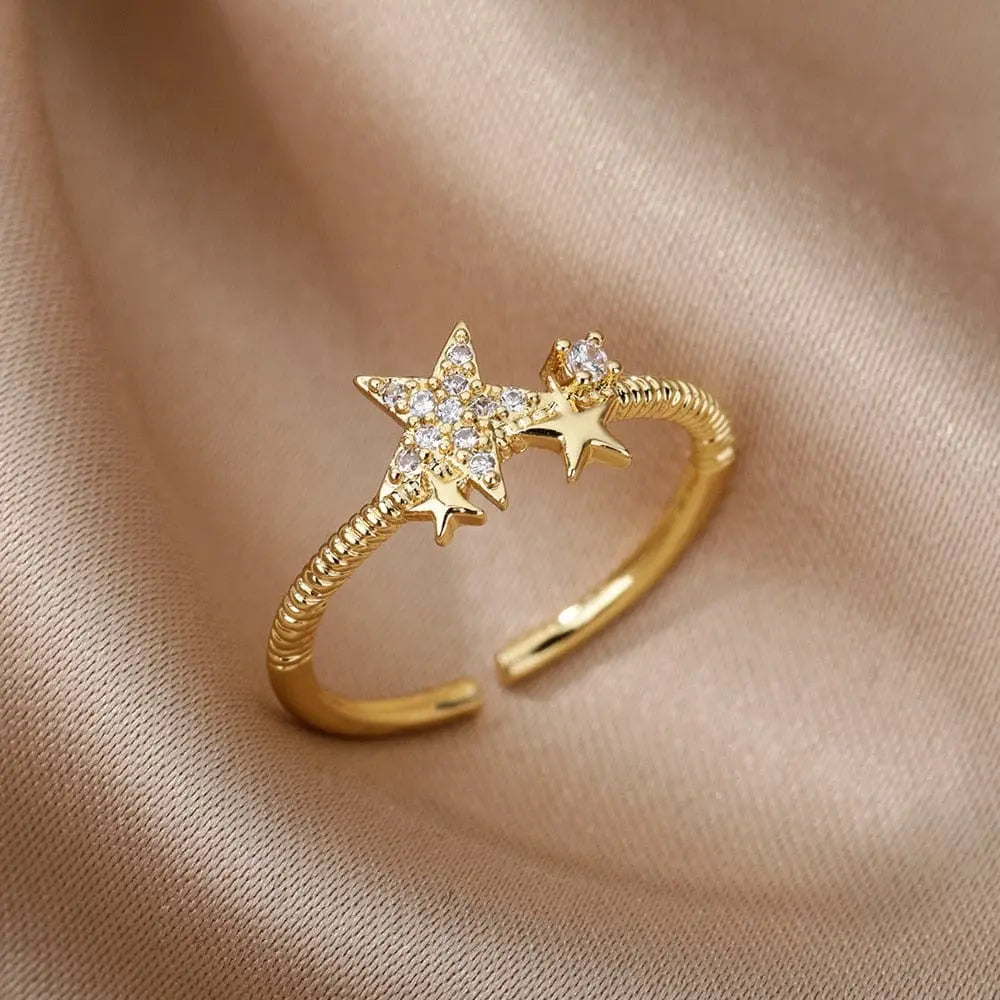 Elegant stainless steel bee and butterfly adjustable ring with cubic zirconia accents, featuring moon and heart designs for women.