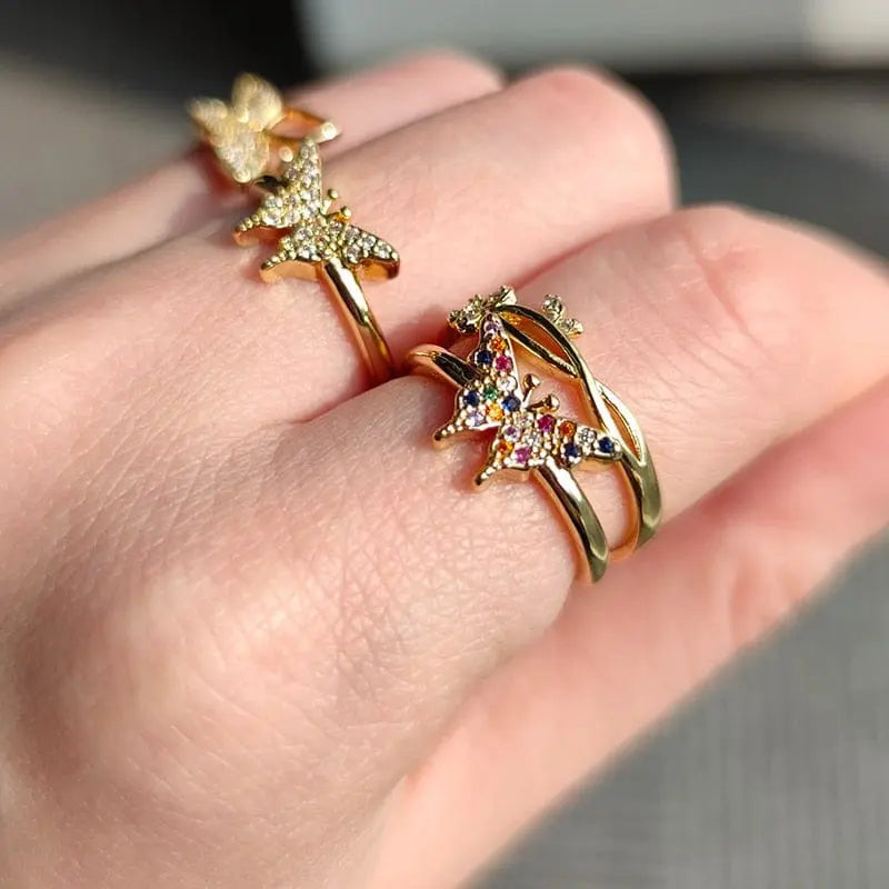 Adjustable stainless steel bee and butterfly ring with cubic zirconia accents, elegant jewelry for women.