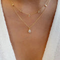Gold boho multilayer chain necklace with pearl, cross, and heart pendants, elegant jewelry piece by Showlu Fashion Store.