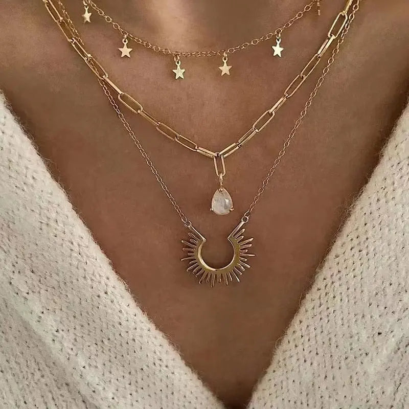 Gold boho multilayer pearl cross and heart pendant necklace featuring elegant jewelry design for women.