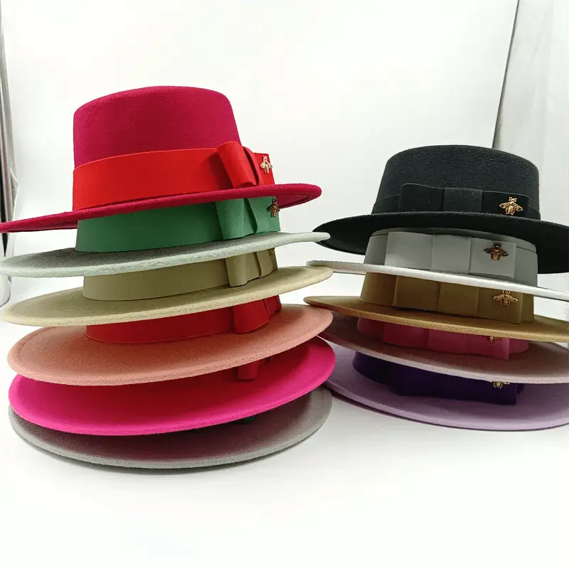 Red Showlu Fedora hat with flat top, bumpy surface, elastic band, and bow tie, suitable for men and women.